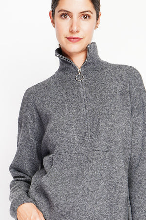 High neck sweater with oversized zip front pocket and long sleeves
