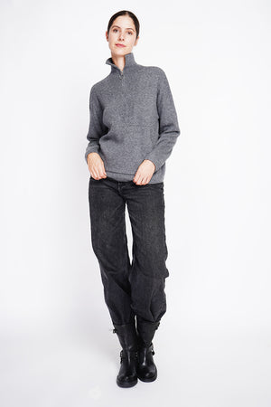 High neck sweater with oversized zip front pocket and long sleeves