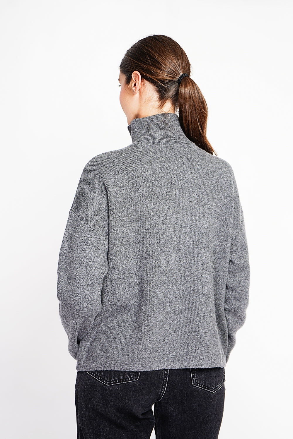 High neck sweater with oversized zip front pocket and long sleeves