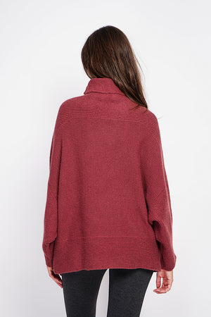 Long sleeve fancy knit turtleneck poncho sweater