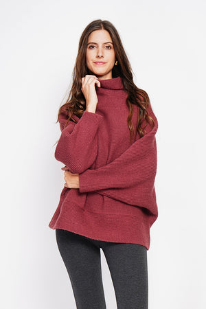 Long sleeve fancy knit turtleneck poncho sweater