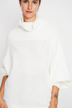 Long sleeve fancy knit turtleneck poncho sweater