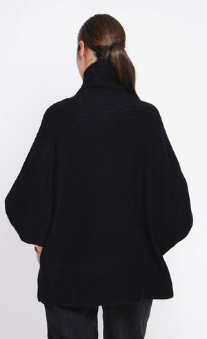 Long sleeve fancy knit turtleneck poncho sweater