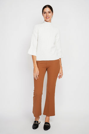 Turtleneck sweater with mid-length musketeer sleeves