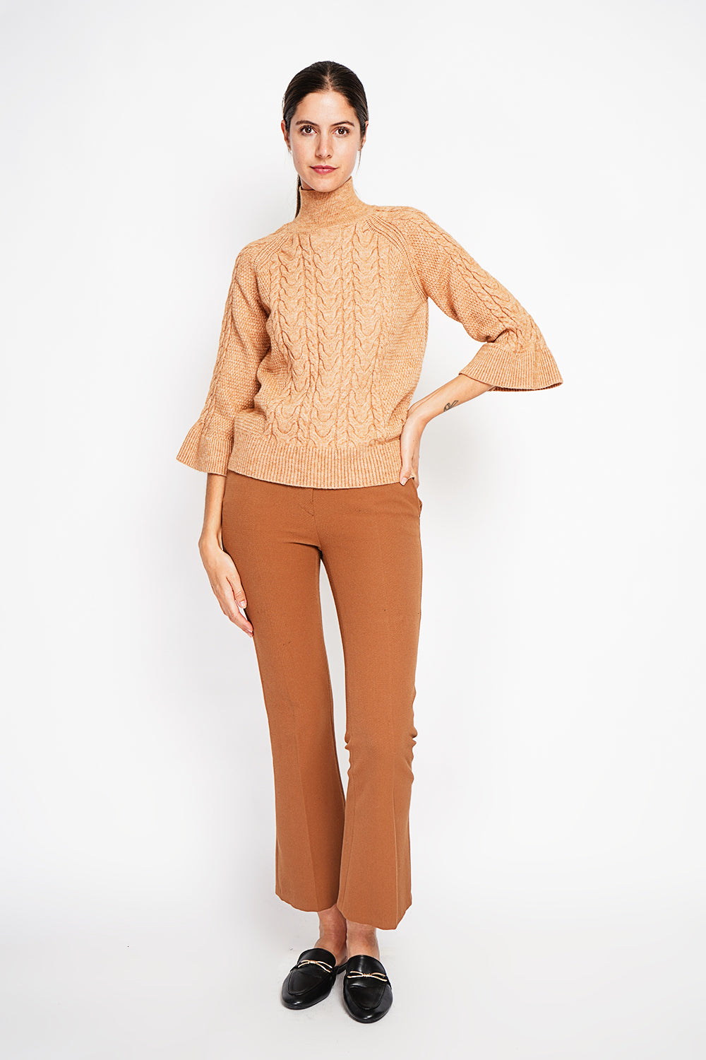 Turtleneck sweater with mid-length musketeer sleeves