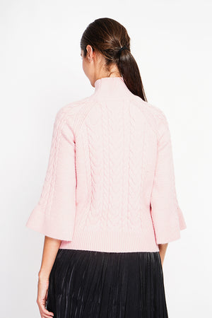 Turtleneck sweater with mid-length musketeer sleeves
