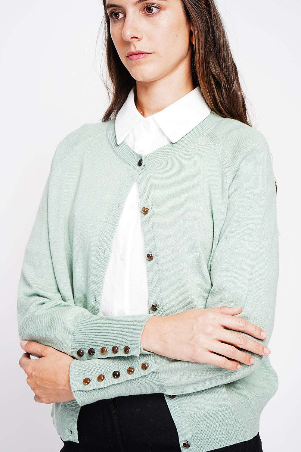 Crew neck oversized cut vest with button placket at the bottom of the long sleeves – Jade green – Assuili