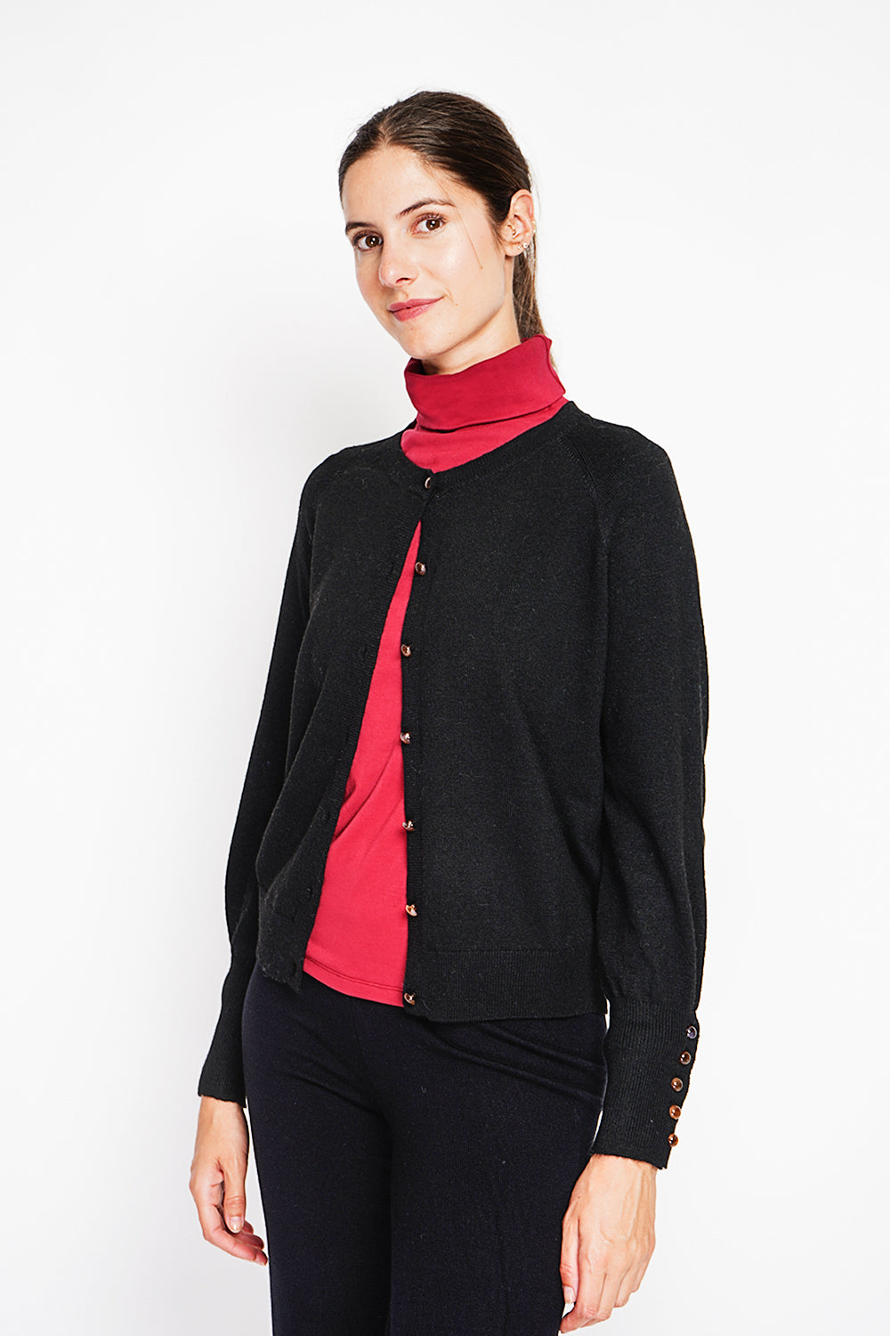 Crew neck oversized cut vest with button placket at the bottom of the long sleeves – Black – Assuili
