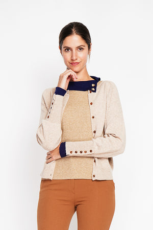 Crew neck oversized cut vest with button placket at the bottom of the long sleeves