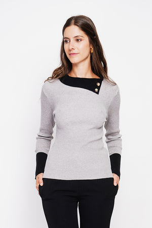 High neck sweater with buttons on the collar and long sleeves