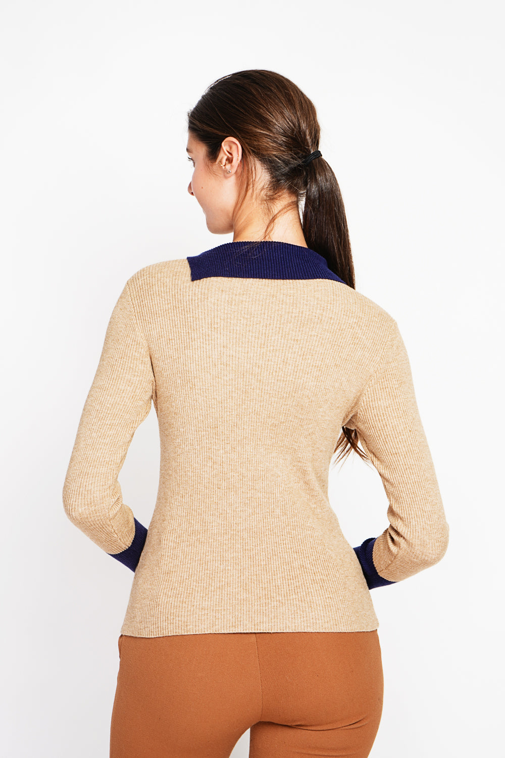 High neck sweater with buttons on the collar and long sleeves