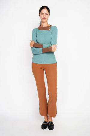 High neck sweater with buttons on the collar and long sleeves