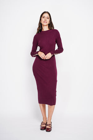 Ribbed high neck dress with buttoning on the long sleeves