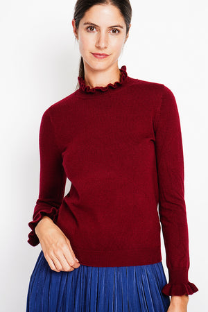 Ruffled high neck sweater with long ruffled sleeves