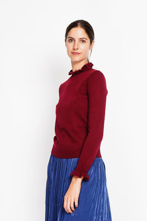 Ruffled high neck sweater with long ruffled sleeves