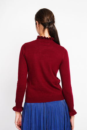 Ruffled high neck sweater with long ruffled sleeves