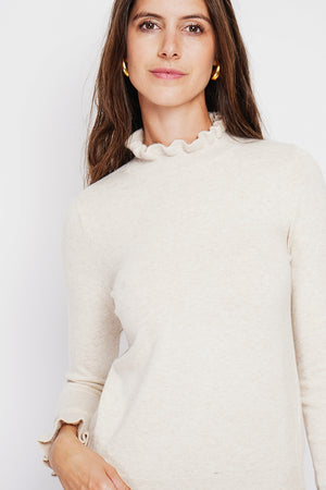 Ruffled high neck sweater with long ruffled sleeves
