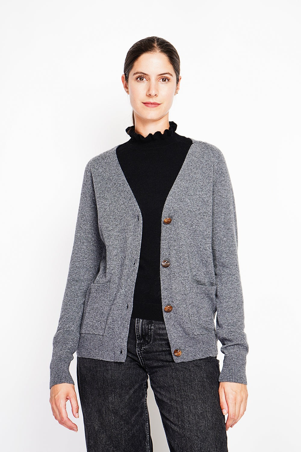Fancy buttoned v-neck oversized fit vest with long sleeve pockets