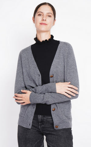 Fancy buttoned v-neck oversized fit vest with long sleeve pockets