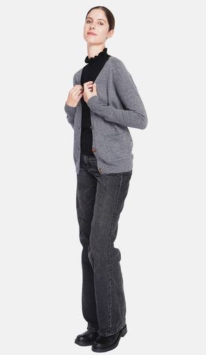 Fancy buttoned v-neck oversized fit vest with long sleeve pockets