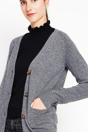Fancy buttoned v-neck oversized fit vest with long sleeve pockets
