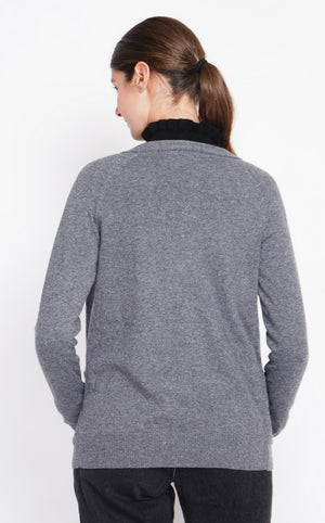 Fancy buttoned v-neck oversized fit vest with long sleeve pockets