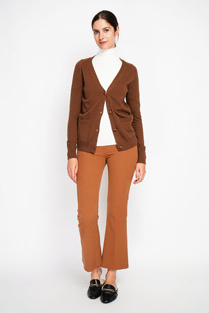 Fancy buttoned v-neck oversized fit vest with long sleeve pockets