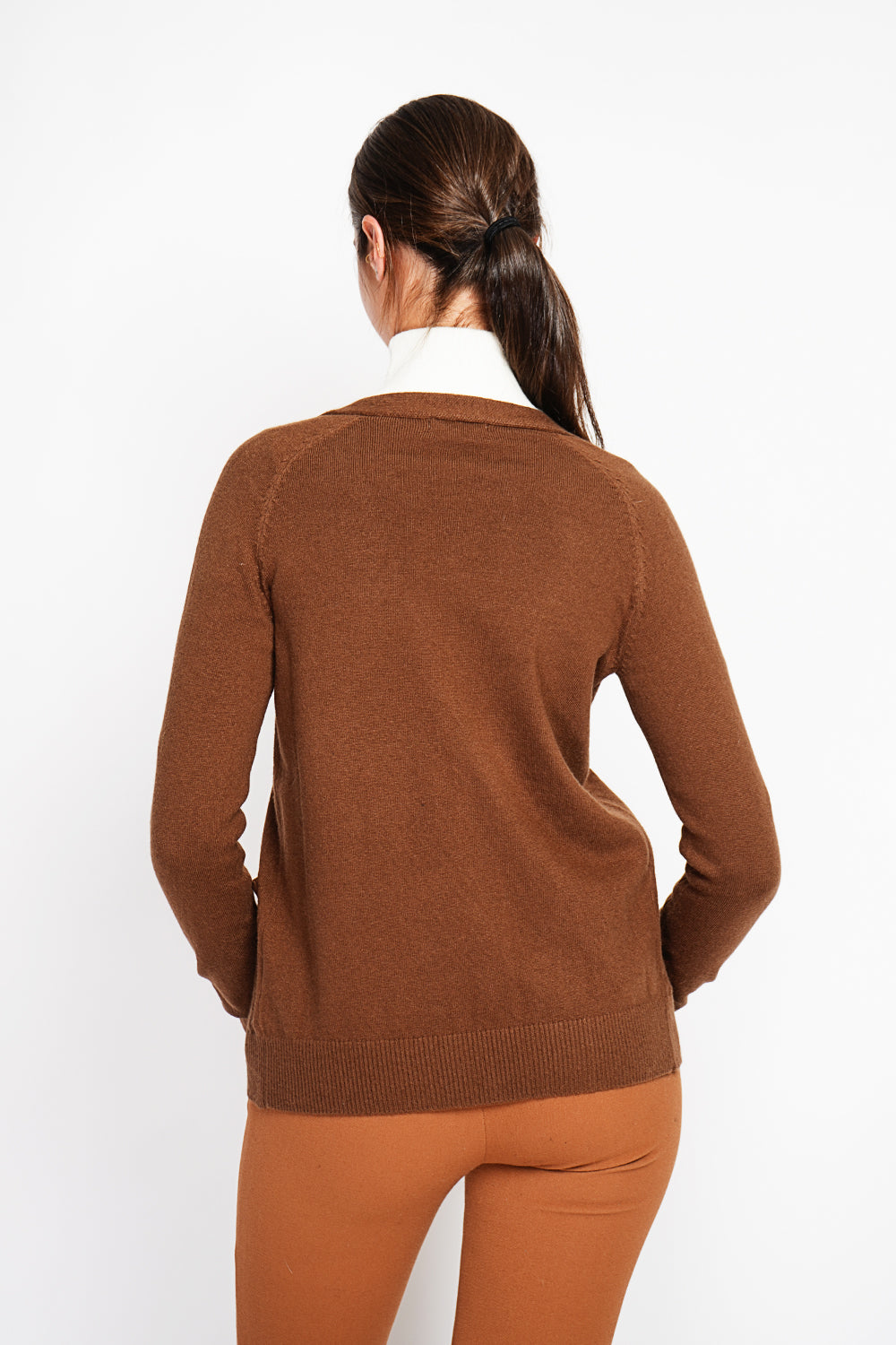 Fancy buttoned v-neck oversized fit vest with long sleeve pockets