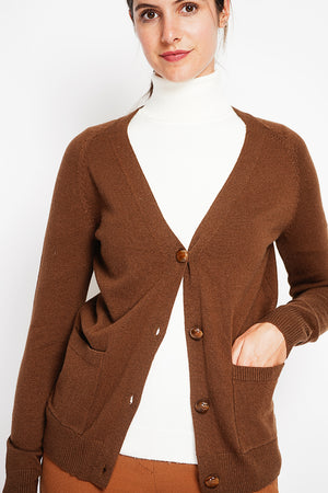 Fancy buttoned v-neck oversized fit vest with long sleeve pockets