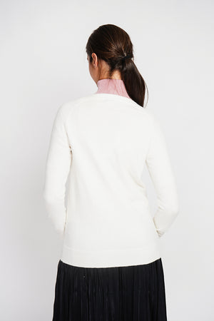 Fancy buttoned v-neck oversized fit vest with long sleeve pockets