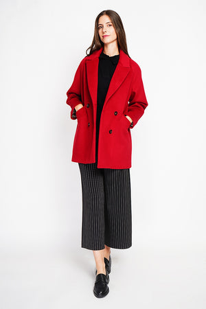 Oversized double-breasted coat with long sleeves and pockets, lined with print