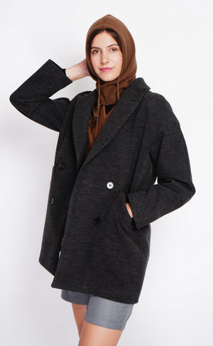 Oversized double-breasted coat with long sleeves and pockets, lined with print