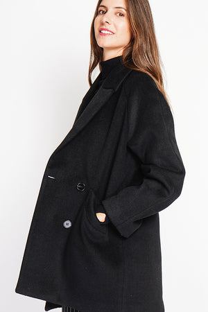 Oversized double-breasted coat with long sleeves and pockets, lined with print