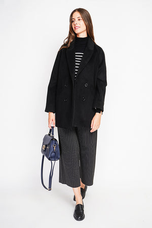 Oversized double-breasted coat with long sleeves and pockets, lined with print