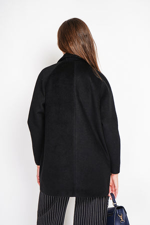 Oversized double-breasted coat with long sleeves and pockets, lined with print
