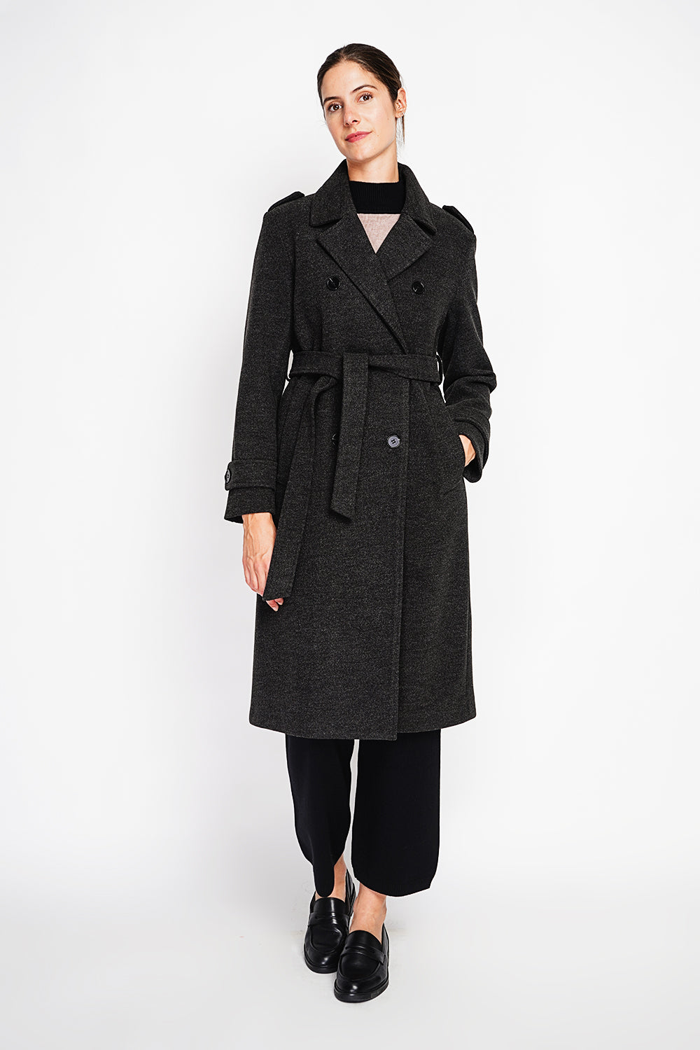 Long lined coat with tailored collar belt and pockets Lined back slit.