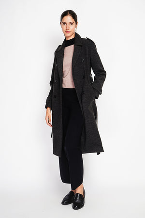 Long lined coat with tailored collar belt and pockets Lined back slit.