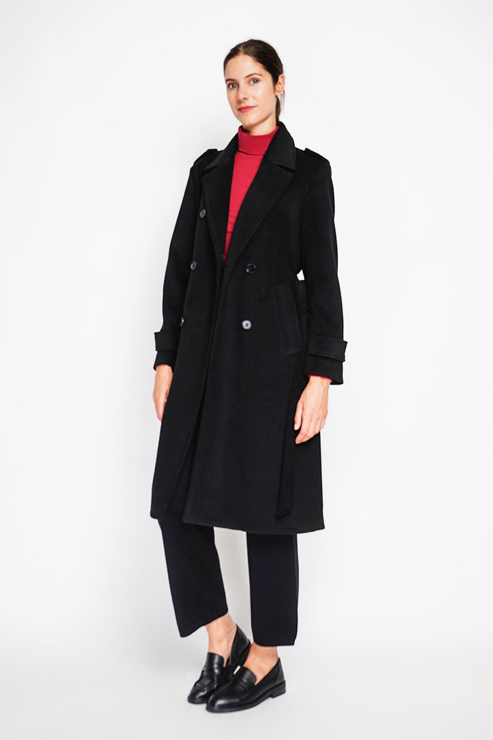 Long lined coat with tailored collar belt and pockets Lined back slit.