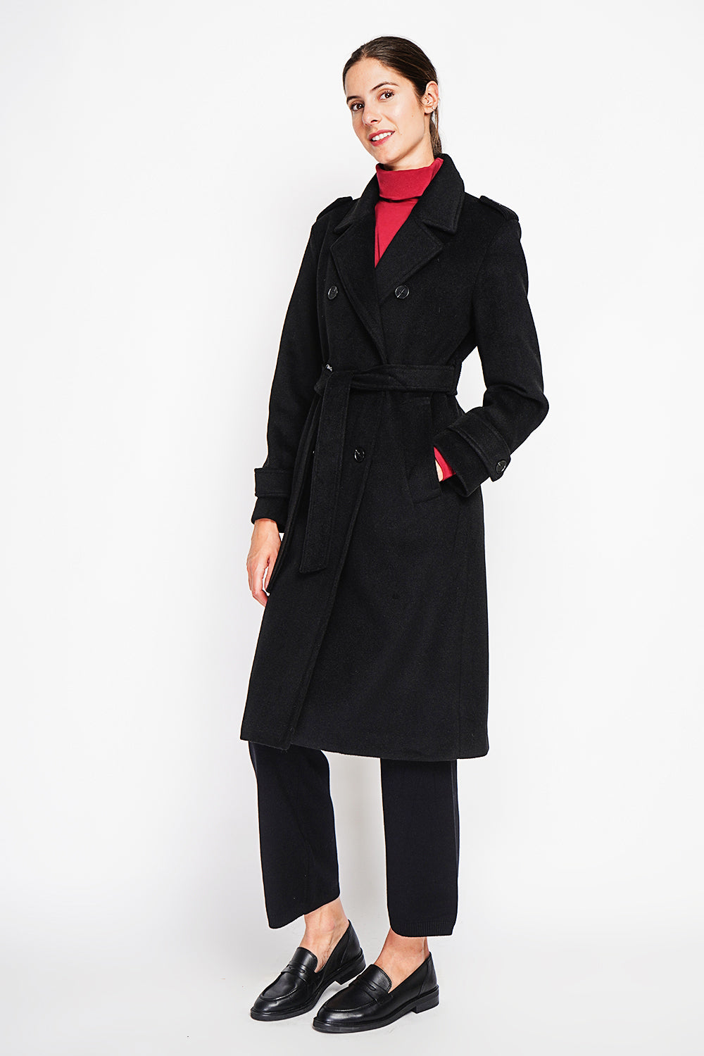 Long lined coat with tailored collar belt and pockets Lined back slit.
