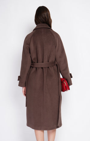 Long oversized coat with double breasted pockets and long sleeves lined