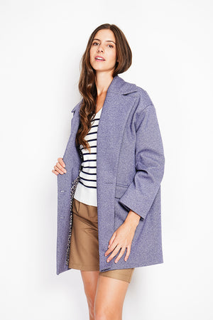 Oversized coat with flap pockets and long sleeves