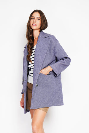 Oversized coat with flap pockets and long sleeves