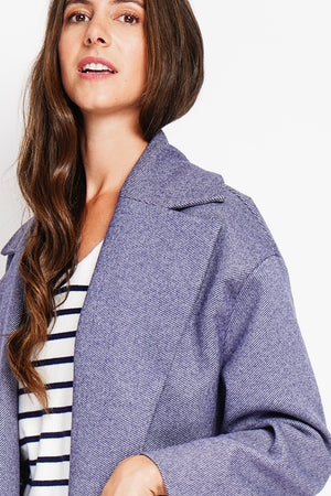 Oversized coat with flap pockets and long sleeves
