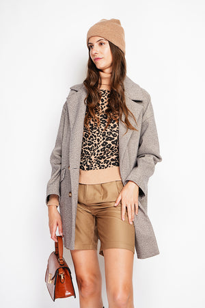 Oversized coat with flap pockets and long sleeves