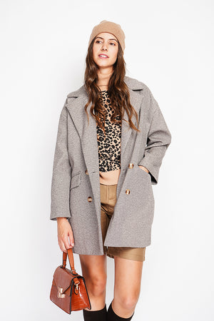 Oversized coat with flap pockets and long sleeves