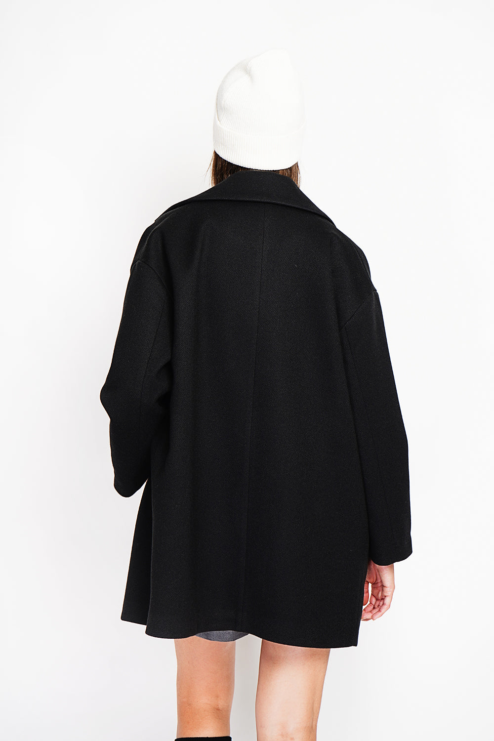 Oversized coat with flap pockets and long sleeves
