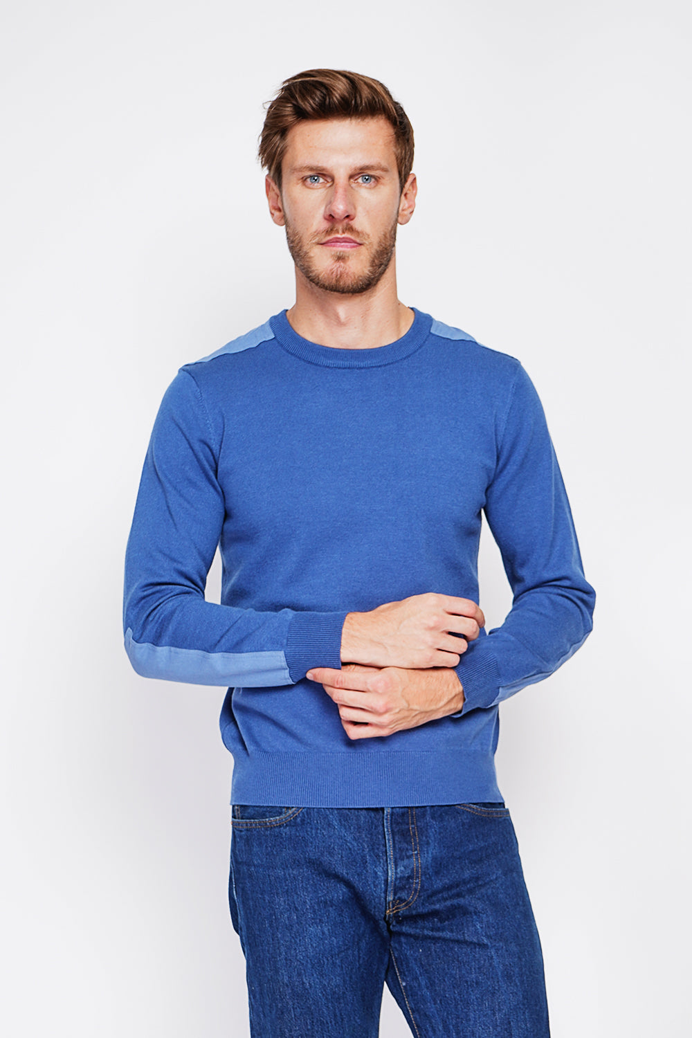 Long sleeve crew neck sweater with shoulder inserts