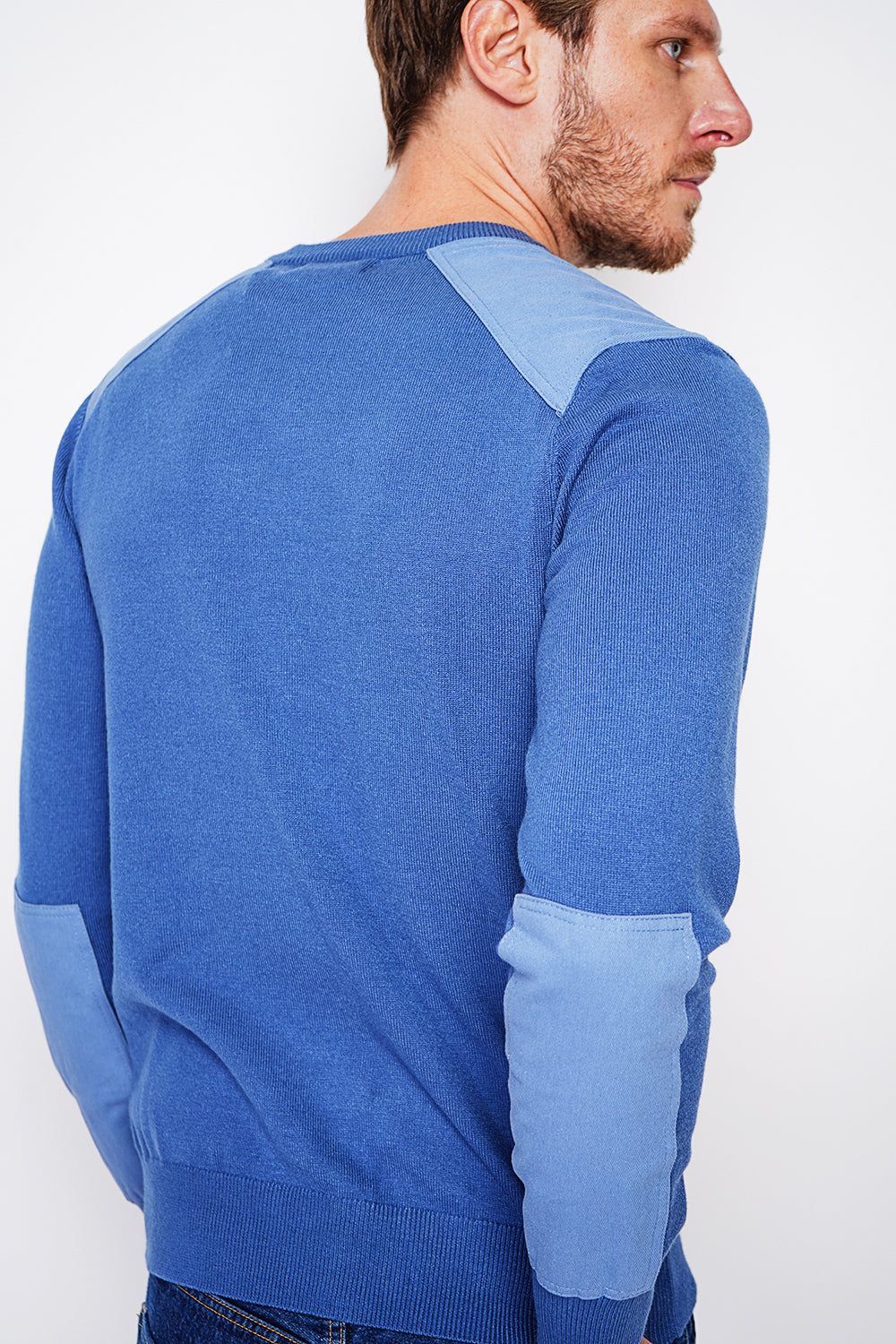 Long sleeve crew neck sweater with shoulder inserts