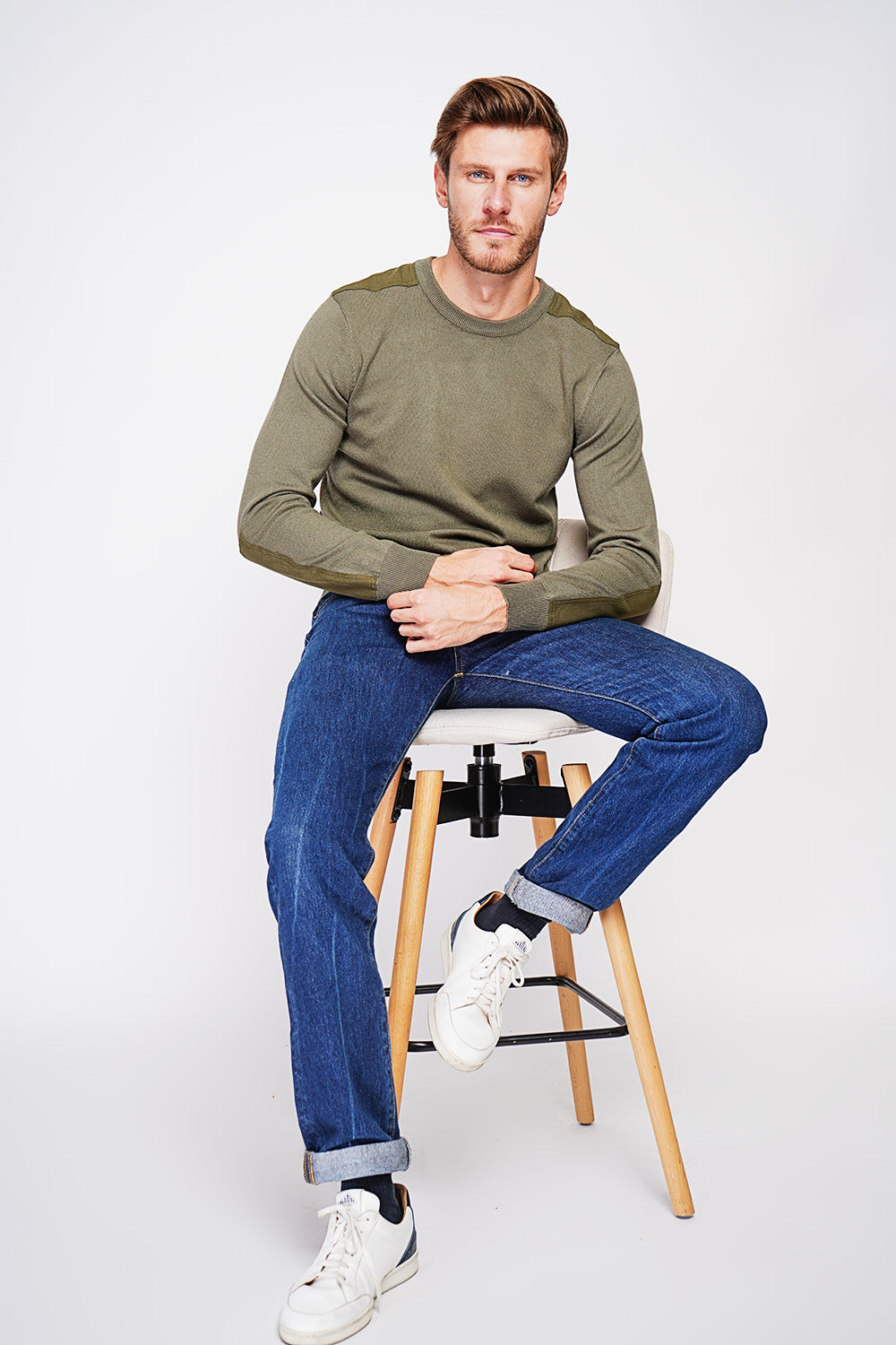 Long sleeve crew neck sweater with shoulder inserts