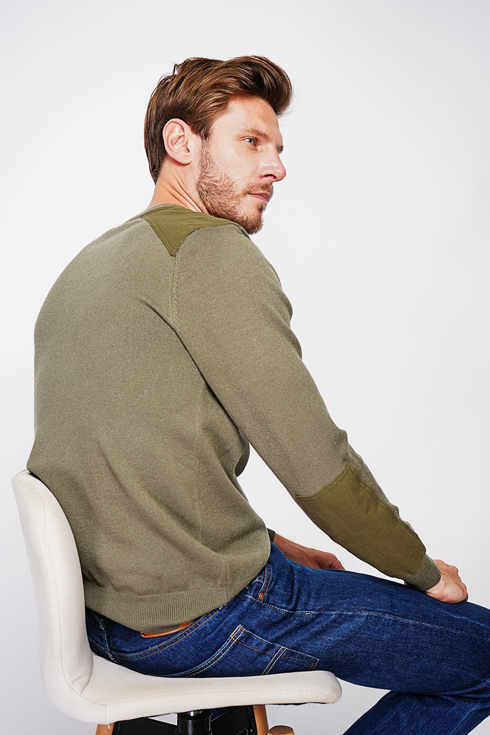 Long sleeve crew neck sweater with shoulder inserts